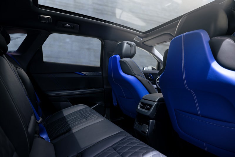 Back Seat View of the 2026 OPTIQ-V Blue Front Seats, Sun Roof, and Interior | Ed Martin Cadillac in ANDERSON IN